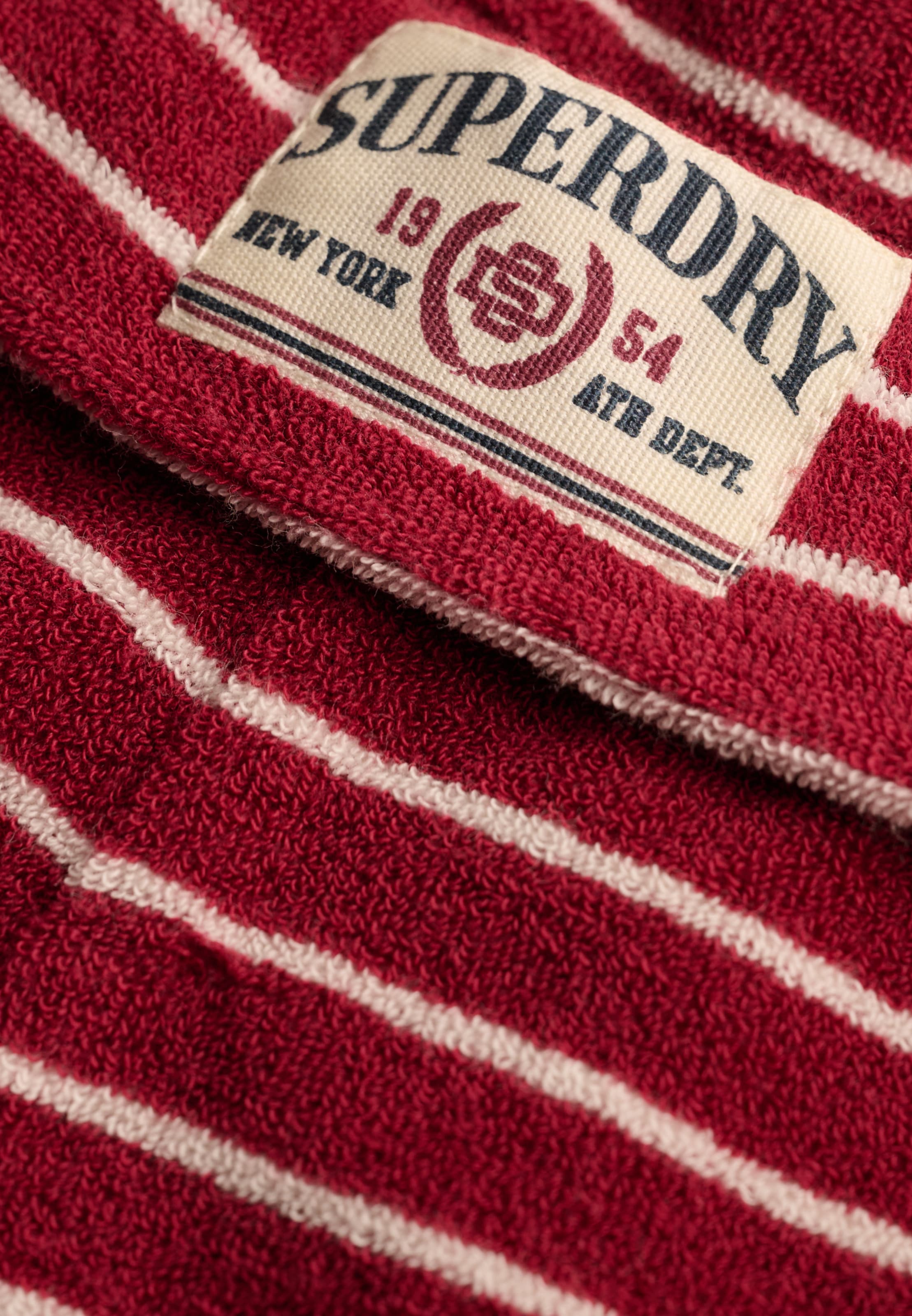 Superdry & Co Pantalon en 38 en crème / rouge carmin, Vue avec produit