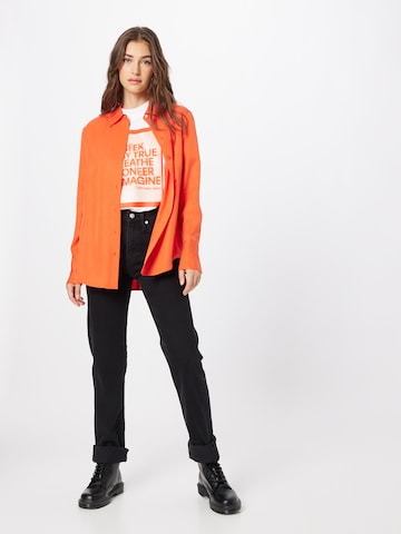 Calvin Klein - Blusa em laranja