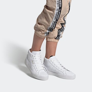 Baskets hautes ADIDAS ORIGINALS en blanc : devant