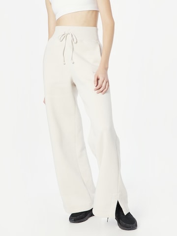 Wide Leg Pantalon 'Phoenix Fleece' NIKE en beige : devant