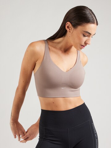 NIKE Bralette Sports bra 'ALATE' in Brown: front