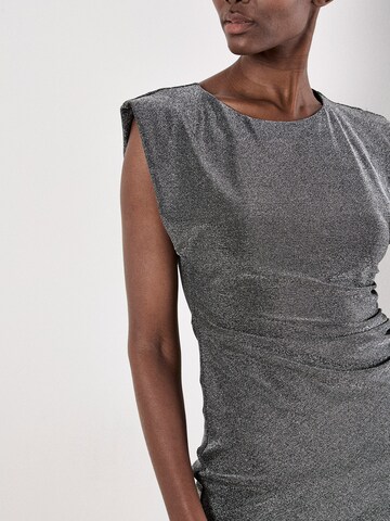 Robe Apricot en argent