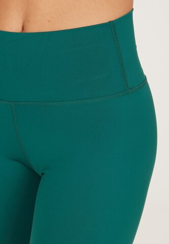 Athlecia Skinny Workout Pants 'Almy' in Green
