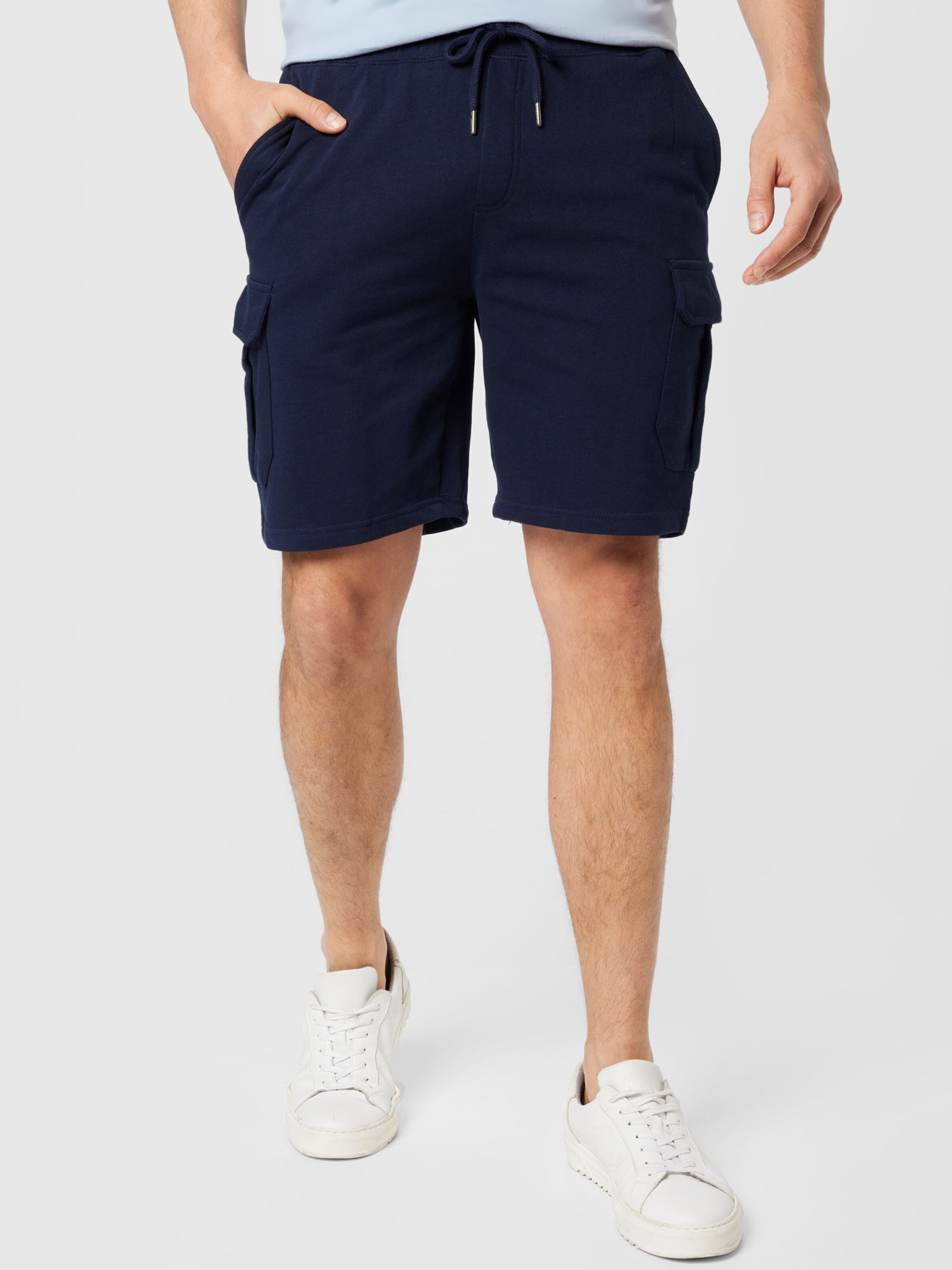 Pantaloncini mare pesci e righe