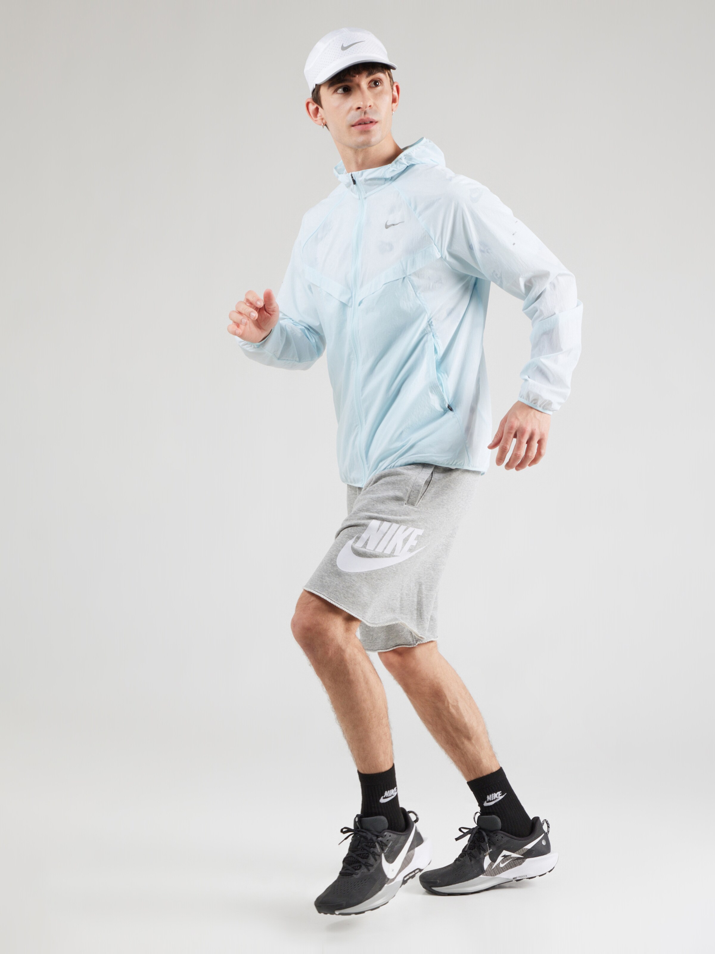 NIKE Functionele jas 'M NK DF UV STRIDE' in Blauw | ABOUT YOU