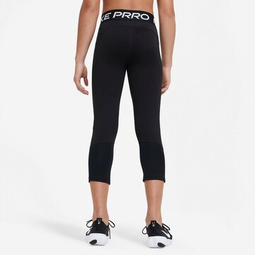 Skinny Pantaloni sportivi di NIKE in nero