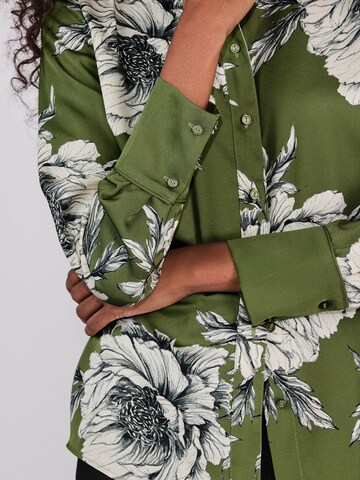 Next Pusero värissä vihreä