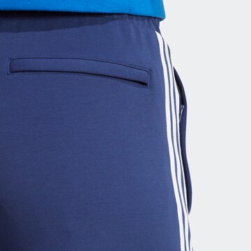 ADIDAS SPORTSWEAR Tapered Sporthose in Blau