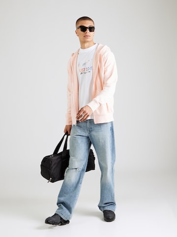 Nike Sportswear - Sudadera con cremallera 'CLUB' en naranja