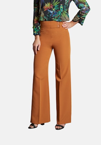 Nicowa Loose fit Pleated Pants in Brown: front