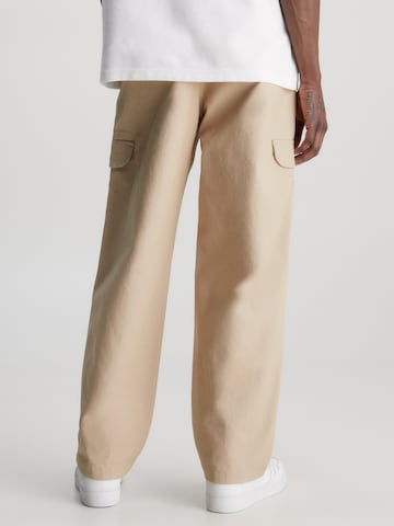 Largi Pantaloni cu buzunare de la Calvin Klein Jeans pe bej