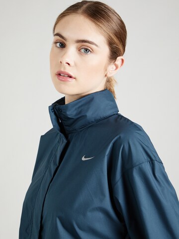 Veste de sport 'FAST' NIKE en bleu