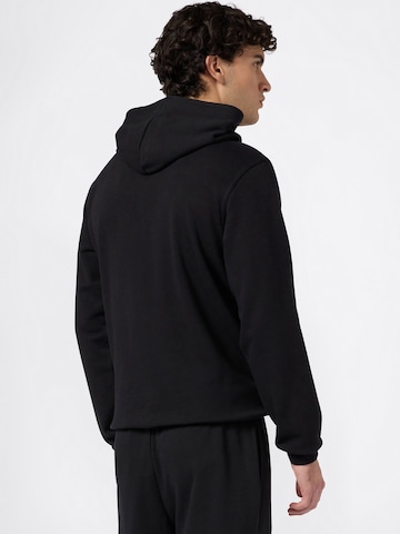 Champion Authentic Athletic Apparel Дънки Tapered Leg Панталон в черно