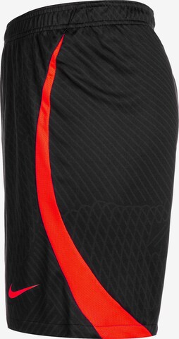 Loosefit Pantaloni sportivi 'Dri-Fit Strike' di NIKE in nero