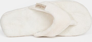 Minnetonka Slipper i beige