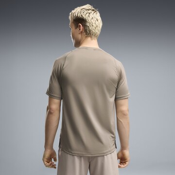 PUMA Performance shirt 'PWRMODE' in Beige