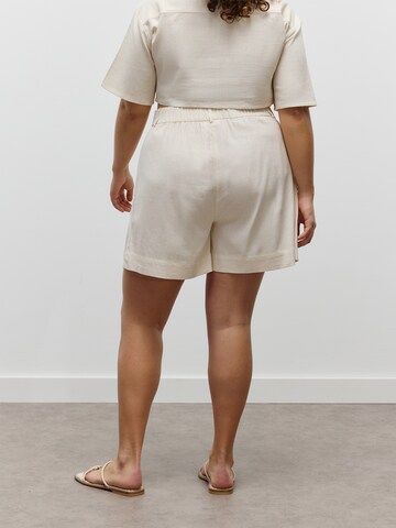 CITA MAASS Wide leg Pleat-front trousers in Beige: front