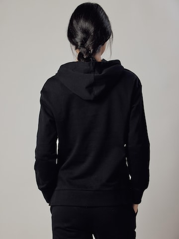 Felpa 'Felpa con Cappuccio e Spacchi Laterali' di OWN Off With Nature in nero