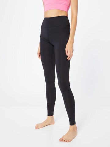 Skinny Pantaloni sport de la Hey Honey pe negru: față