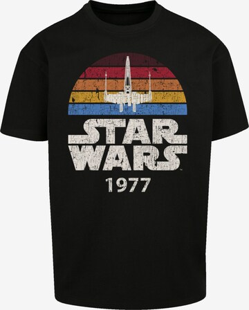 F4NT4STIC T-Shirt 'Star Wars X-Wing Trip 1977 T' in Schwarz: predná strana