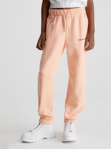 Calvin Klein Jeans Tapered Hose in Orange: predná strana