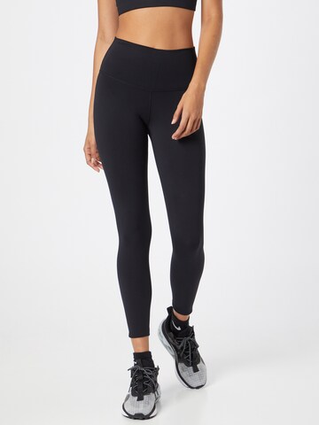 Skinny Leggings de la NIKE pe negru: față