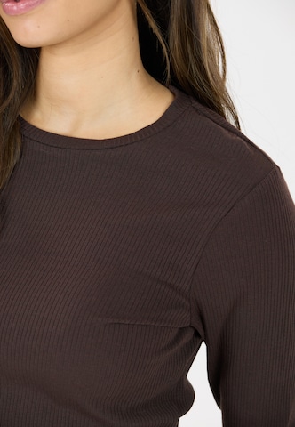 Athlecia Functioneel shirt 'Lankae' in Bruin