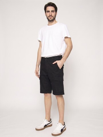 Carhartt WIP Baggy Cargojeans 'Aviation' in Zwart