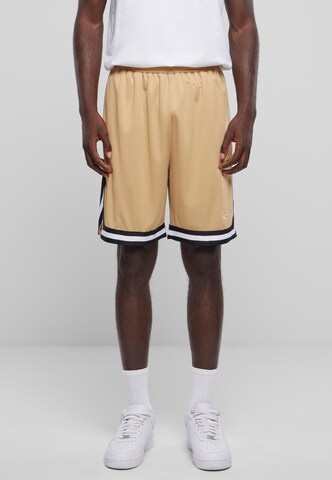 regular Pantaloni di Karl Kani in marrone: frontale