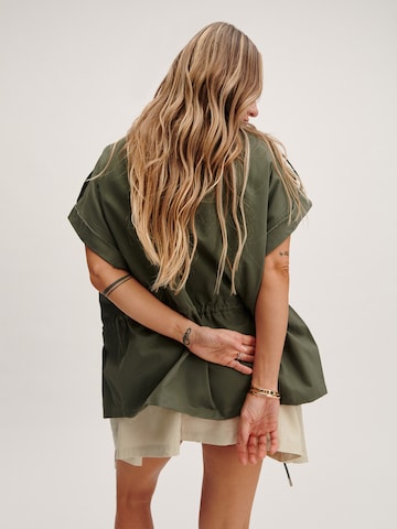 Tatiana Zidekova Väst i grön