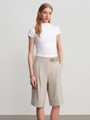 Wide leg Pantaloni di Dilvin in beige
