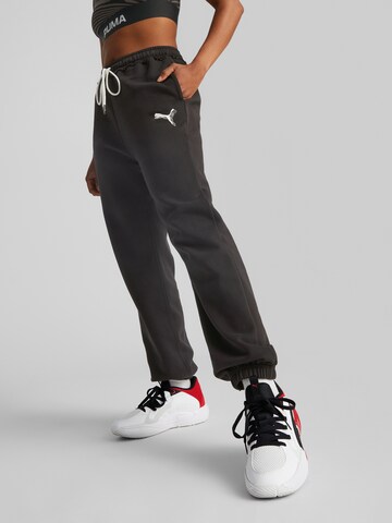 PUMA Tapered Sportbroek in Zwart: voorkant