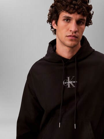 Sweat-shirt 'Premium' Calvin Klein Jeans en noir