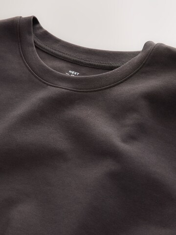 Tricou de la Next pe maro