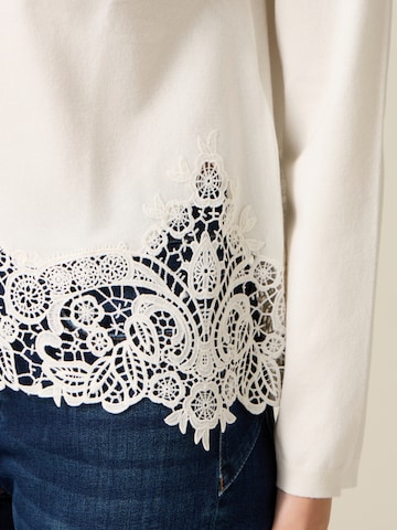 Pullover di oltre in bianco