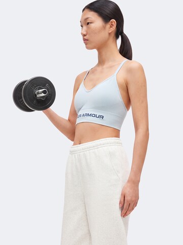 Bustino Reggiseno sportivo 'Vanish Seamless' di UNDER ARMOUR in blu