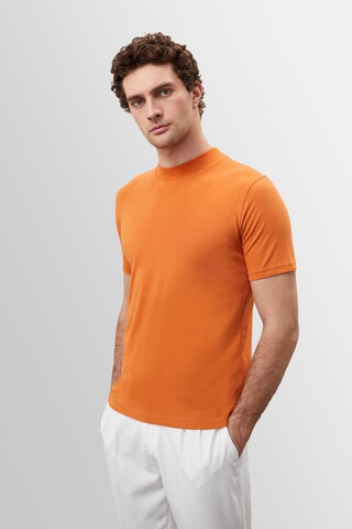 Antioch Bluser & t-shirts i orange
