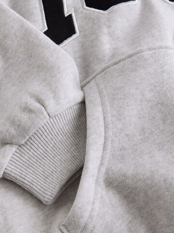 Felpa di Next in grigio