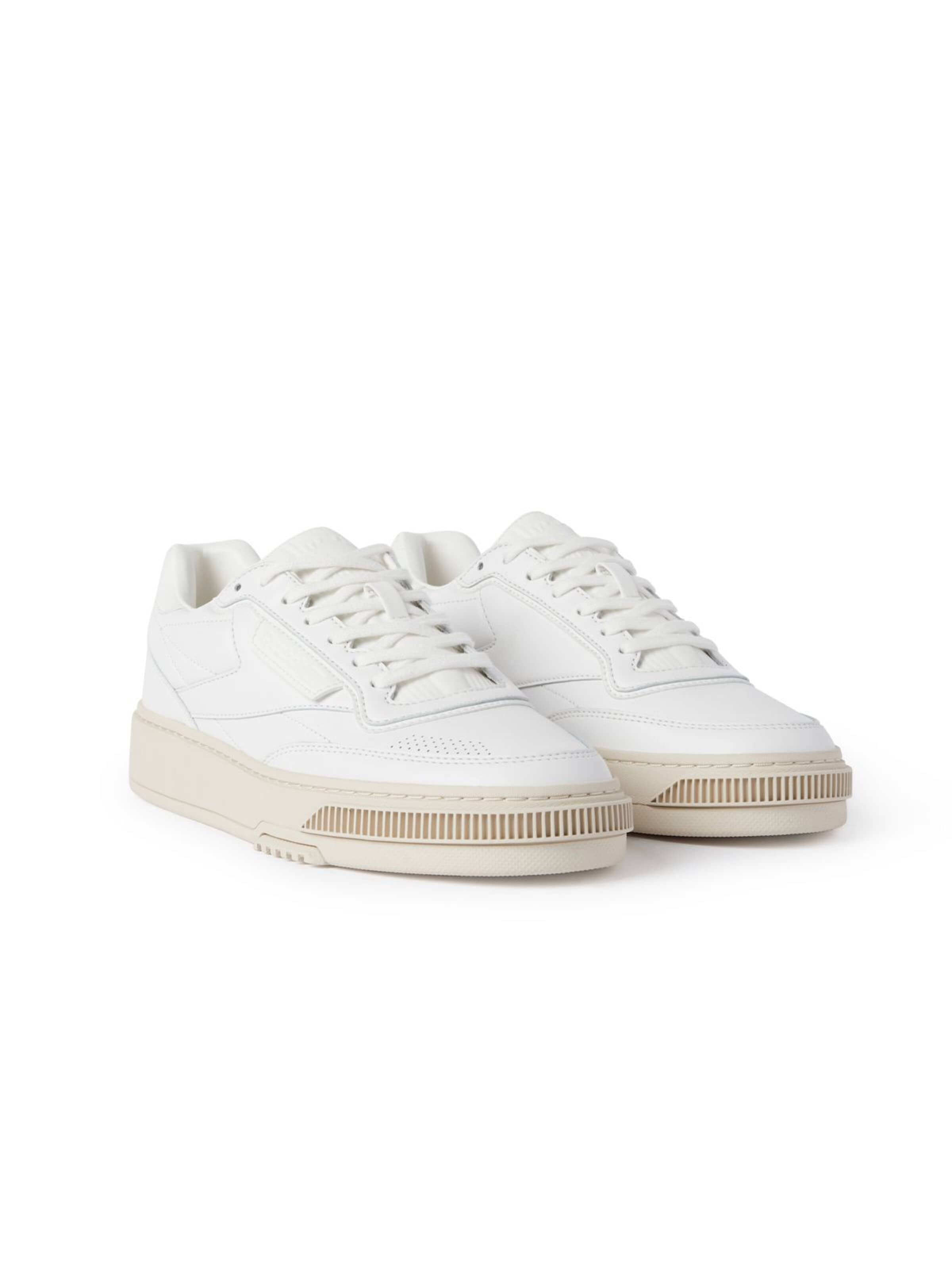 Reebok - Zapatos con cordón en blanco