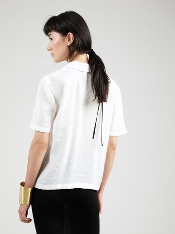 River Island - Blusa en blanco