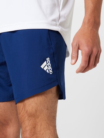 ADIDAS SPORTSWEAR Normalny krój Spodnie sportowe 'Designed for Movement' w kolorze niebieski