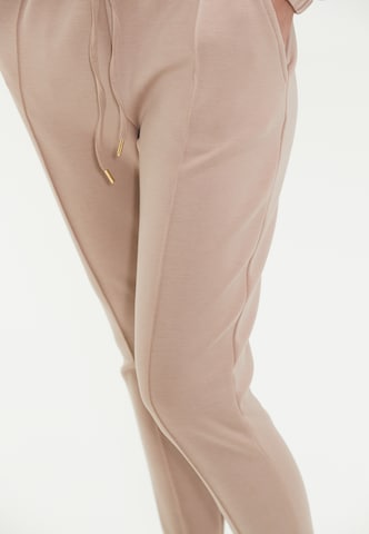 Athlecia Skinny Sweatpants 'Jacey' in Beige