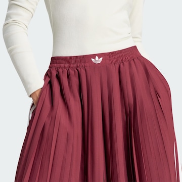 ADIDAS ORIGINALS - Pierna ancha Pantalón en rojo