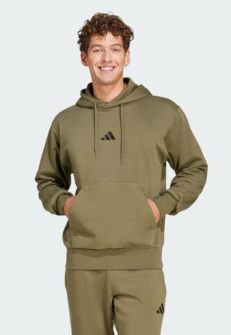 ADIDAS SPORTSWEAR - Camiseta deportiva 'Essentials Feelcozy' en verde: frente