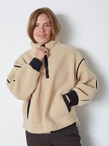 Pull-over 'Madin' co'couture en beige