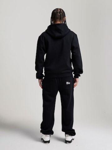 AND1 Конический (Tapered) Штаны 'Staple Graphic' в Черный