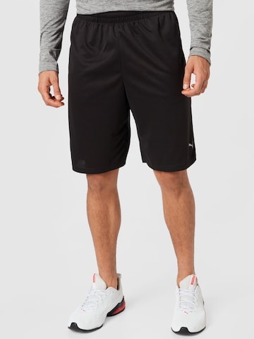PUMA Athletic Pants in Black: front