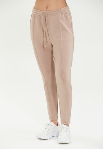 Athlecia Skinny Workout Pants 'Jacey' in Beige: front