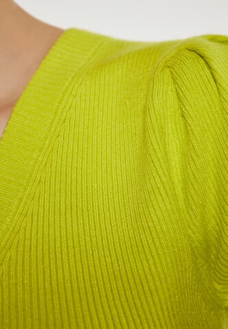 Cardigan swirly en vert