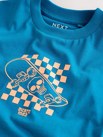 Next - Camiseta en azul